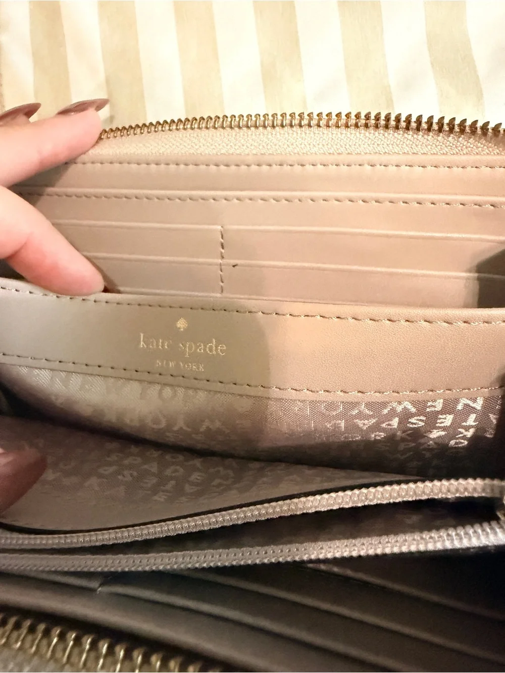 kate spade blush nude pebbled zip-around wallet